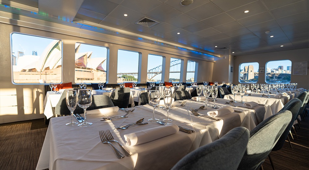 Sydney Opera House and Harbour Bridge views from the Magistic lunch cruise dining deck