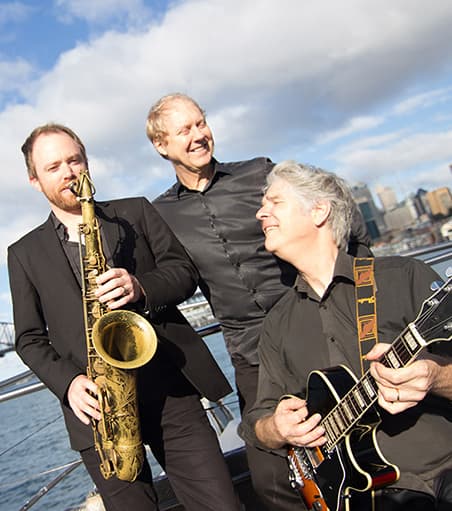 Jazz musicians playing on board a Sydney Harbour cruise